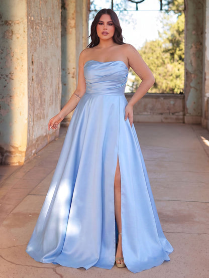 Light blue strapless satin A-line gown with high slit on model