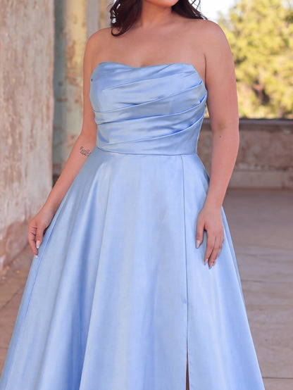 Close-up of the light blue strapless satin gown's draped bodice and skirt