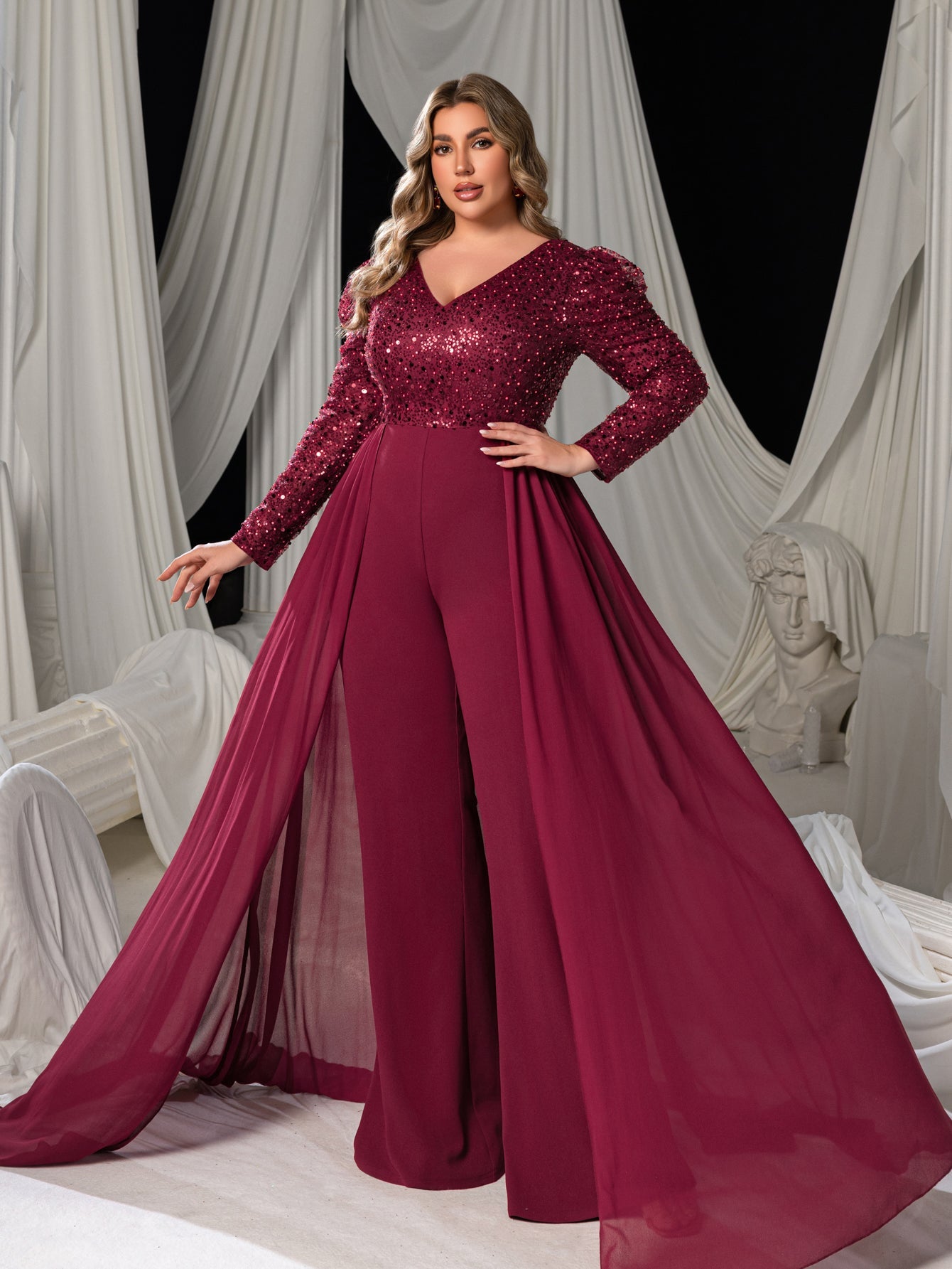Burgundy plus-size prom jumpsuit side view